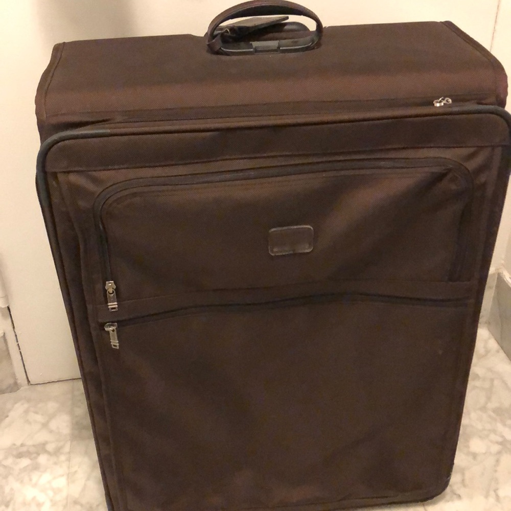 Tumi Suitcase- Xtra Lg, 29”H x 22.5”W x 11”D.